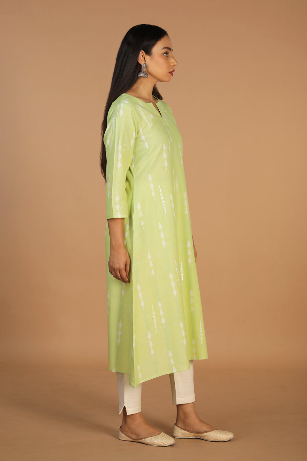 Collection of Tea green embriodered Pochampally Ikat kurta in a gallery layout