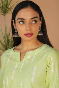 Collection of Tea green embriodered Pochampally Ikat kurta in a gallery layout