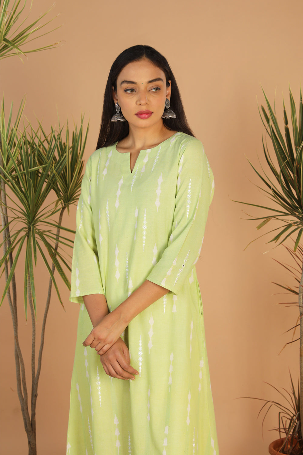 Collection of Tea green embriodered Pochampally Ikat kurta in a gallery layout