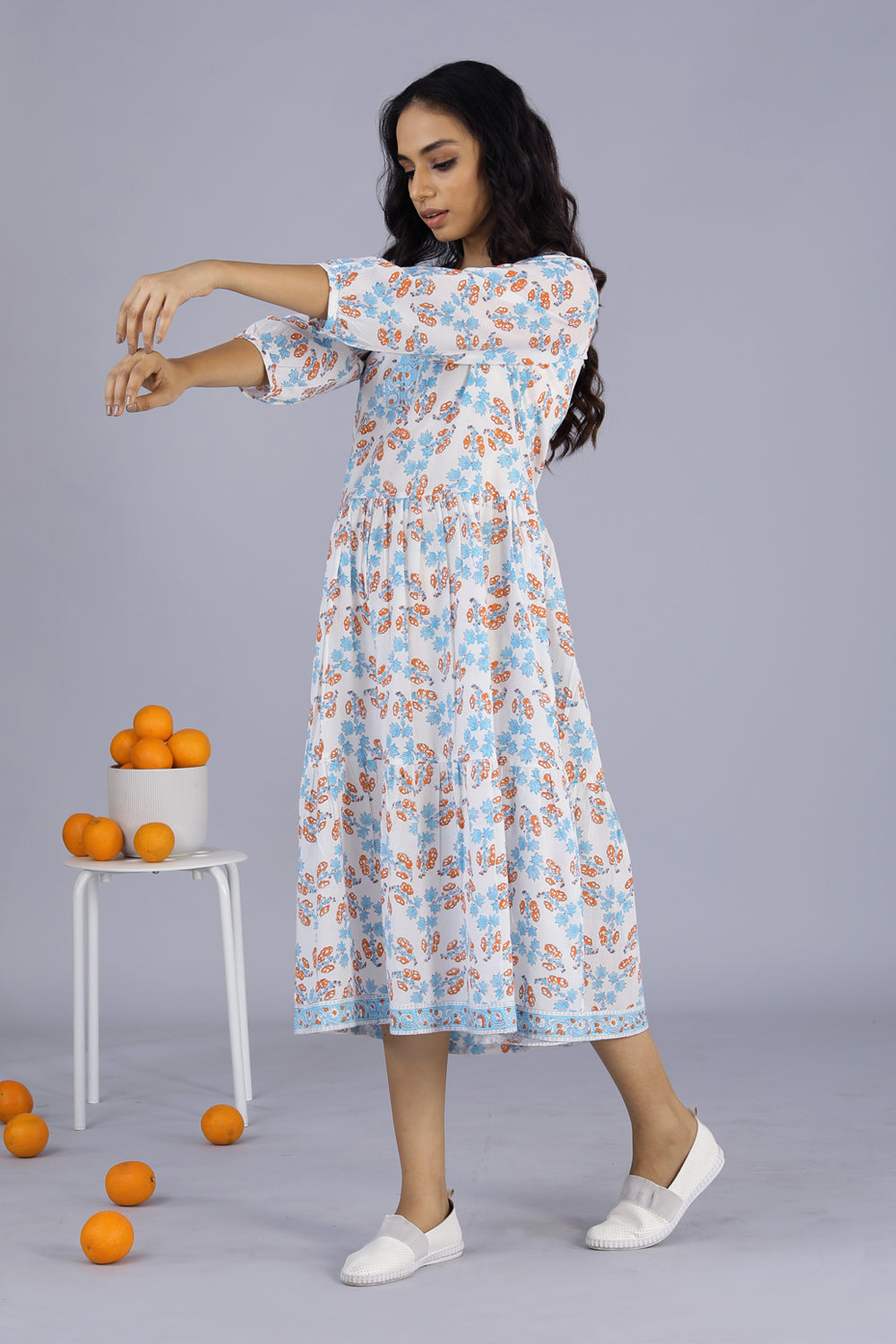 Collection of Handblock printed cotton tiered dress in a gallery layout