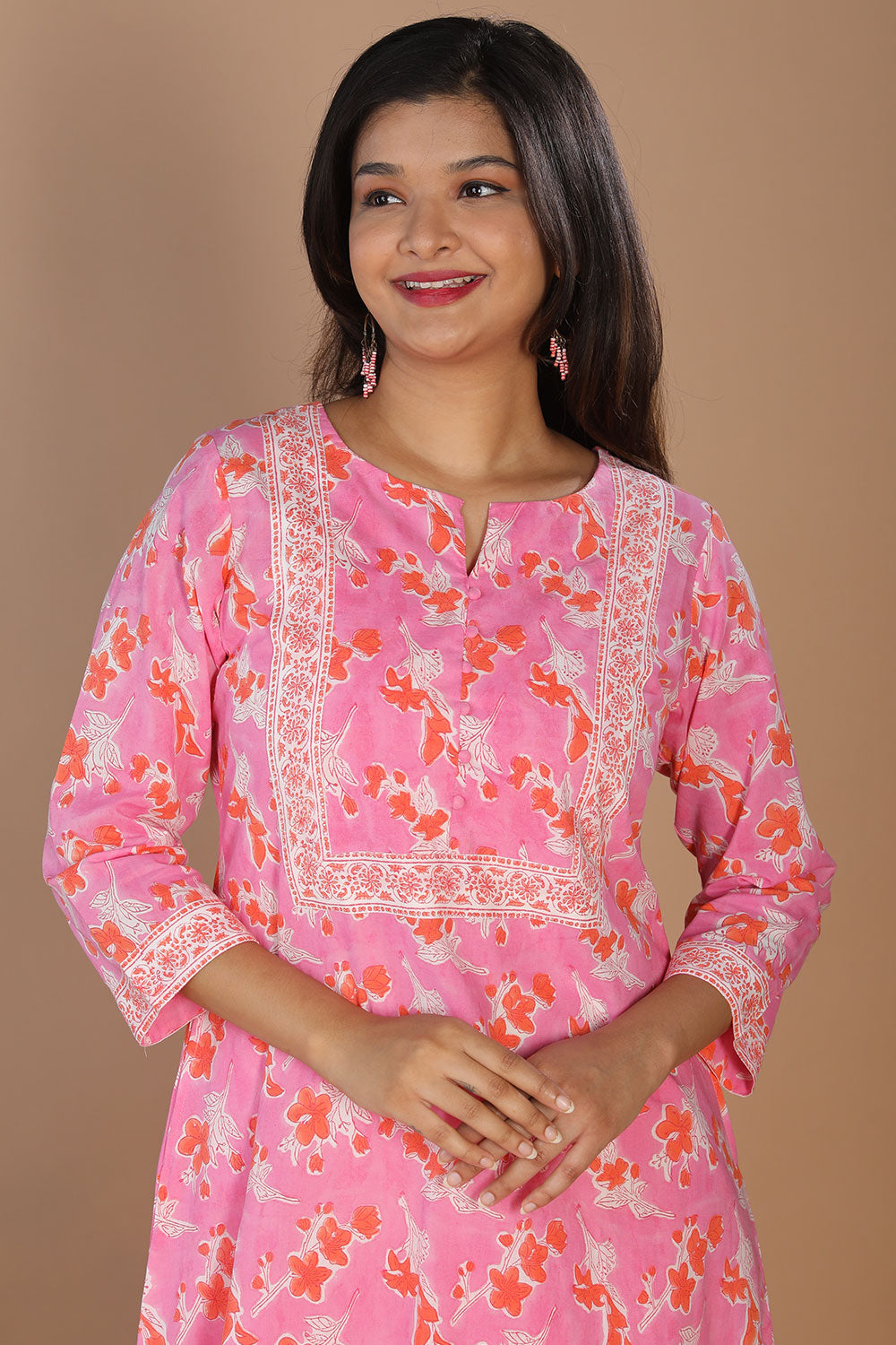 Collection of Persian pink handblock printed kurti in a gallery layout