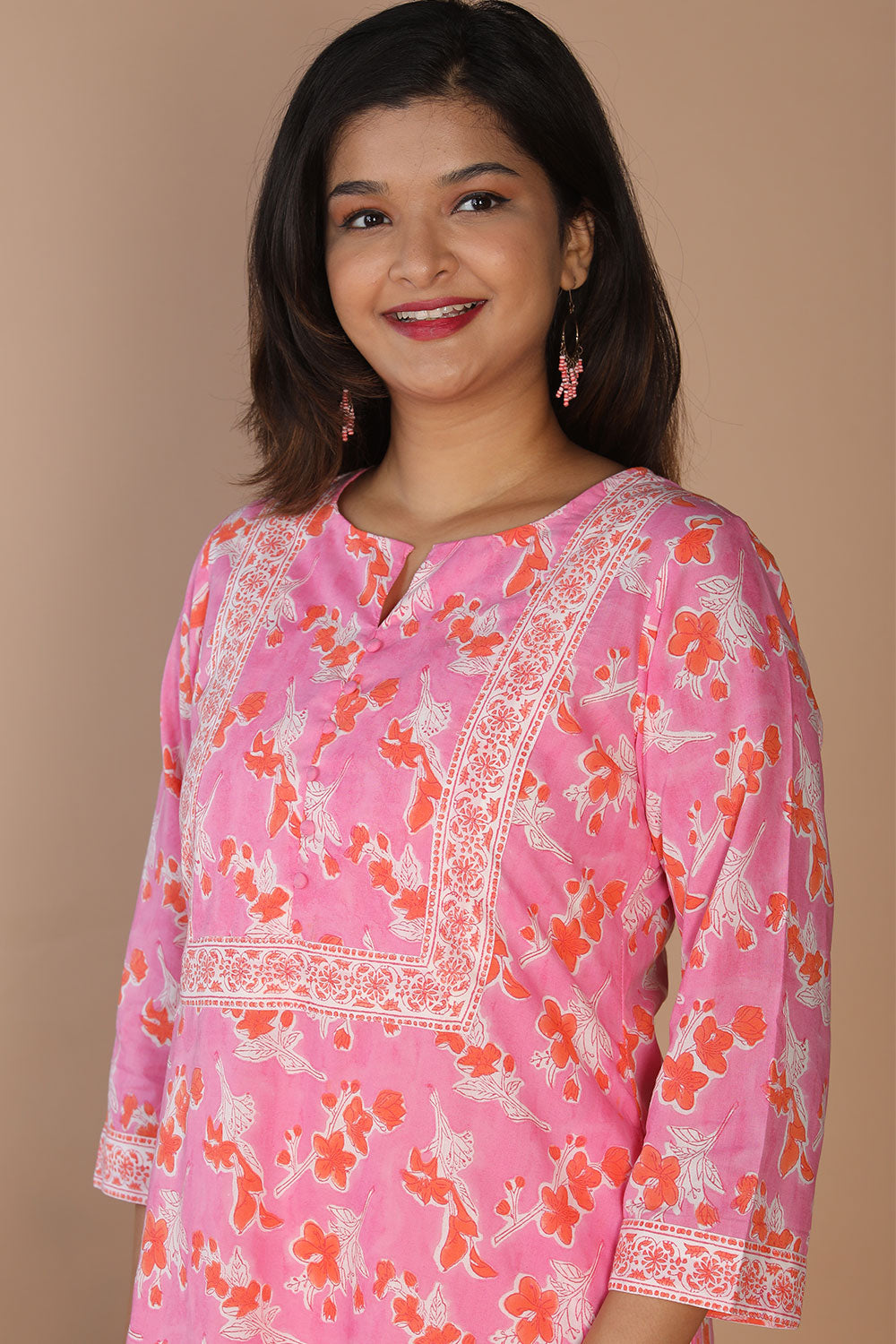 Collection of Persian pink handblock printed kurti in a gallery layout