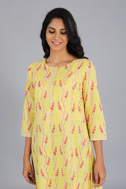 Collection of Handblock printed yellow kurti in a gallery layout