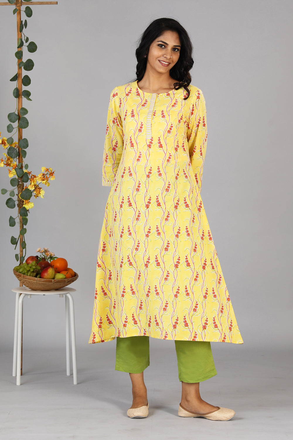 Collection of Handblock printed yellow kurti in a gallery layout