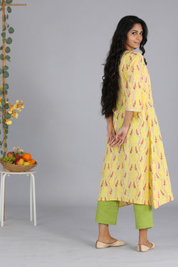 Collection of Handblock printed yellow kurti in a gallery layout