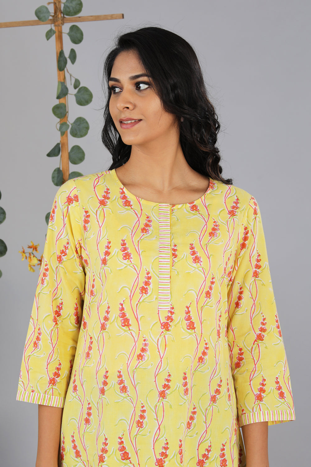 Collection of Handblock printed yellow kurti in a gallery layout