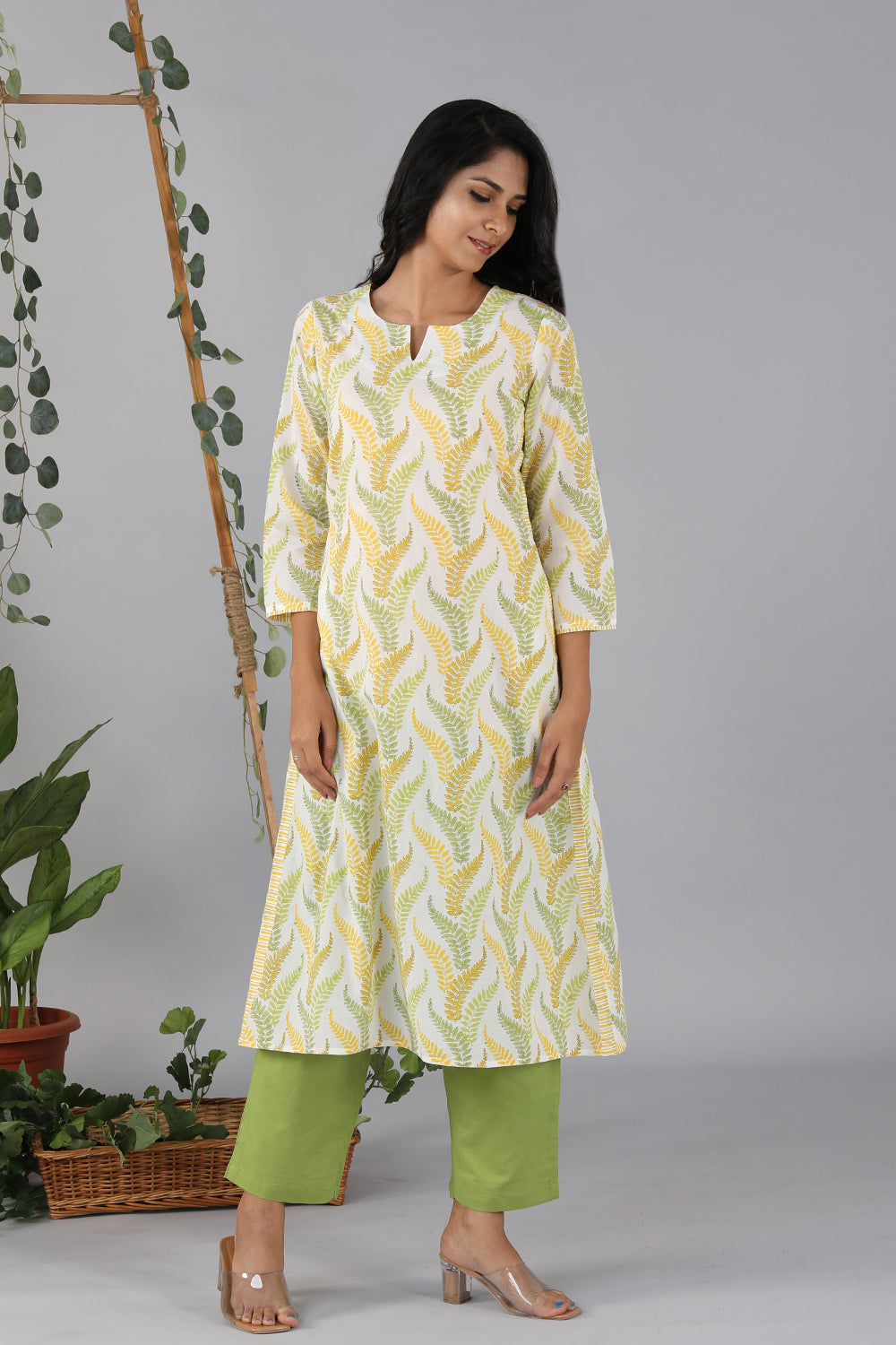 Collection of Lime yellow handblock printed cotton kurti in a gallery layout