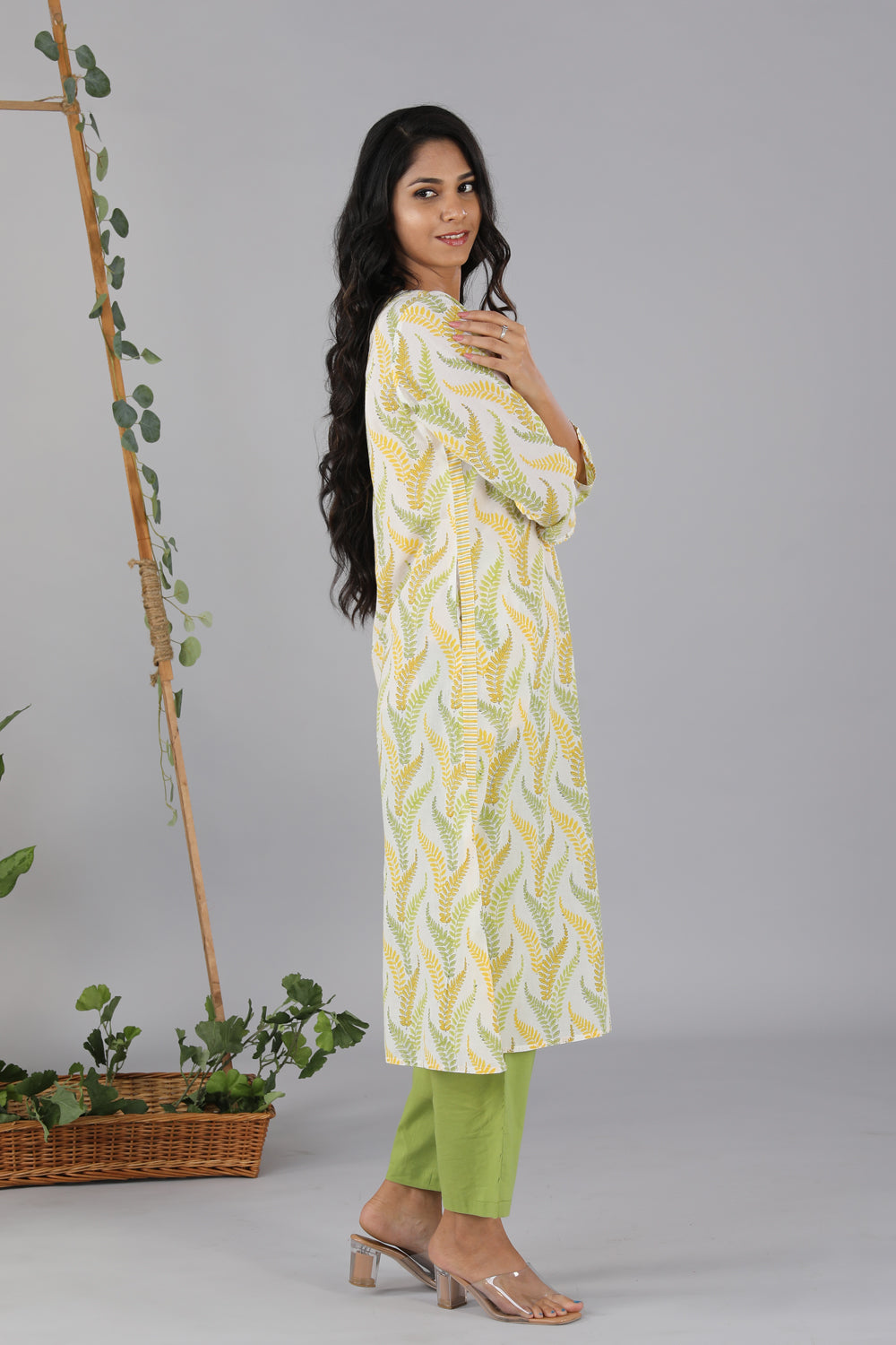 Collection of Lime yellow handblock printed cotton kurti in a gallery layout