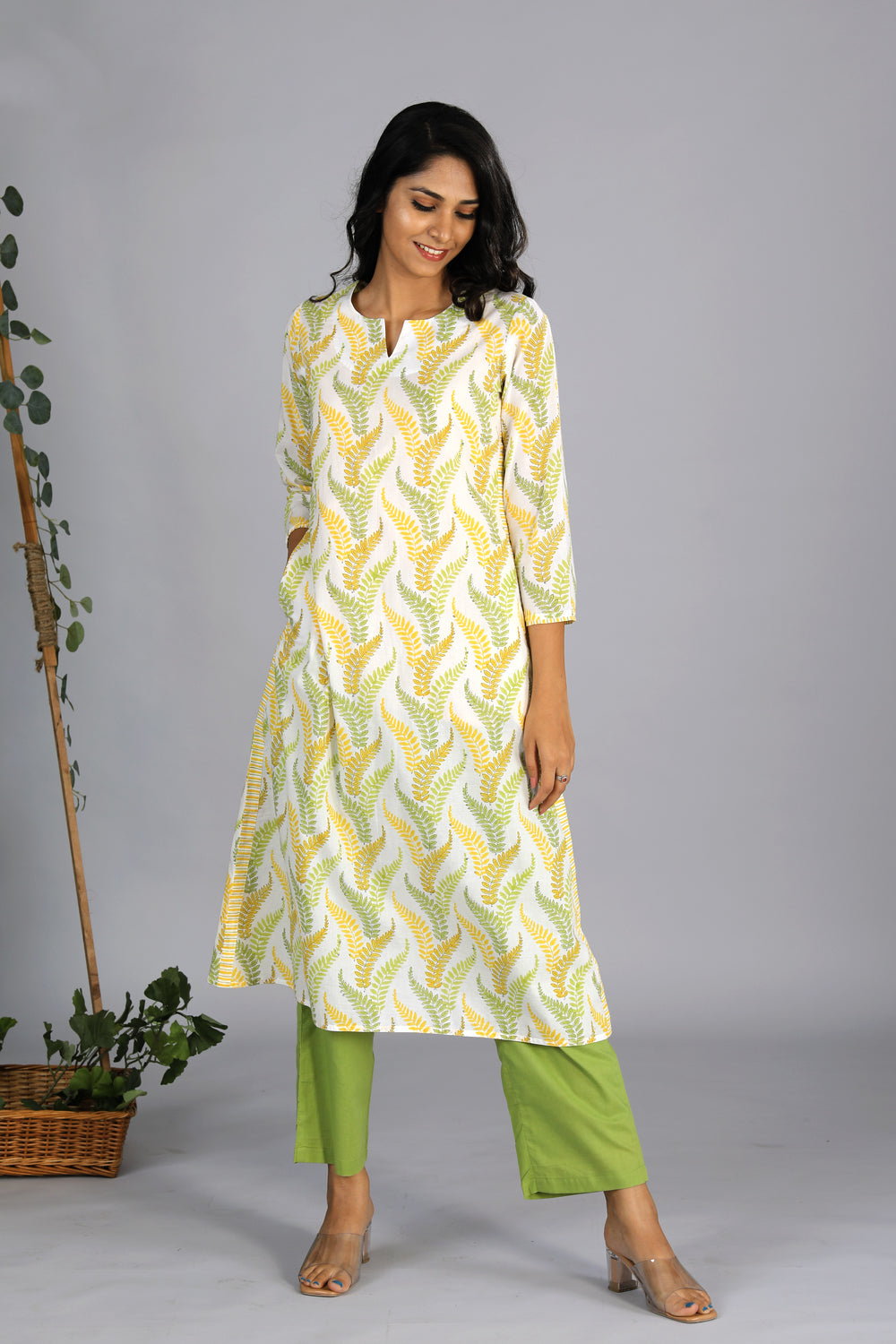 Collection of Lime yellow handblock printed cotton kurti in a gallery layout