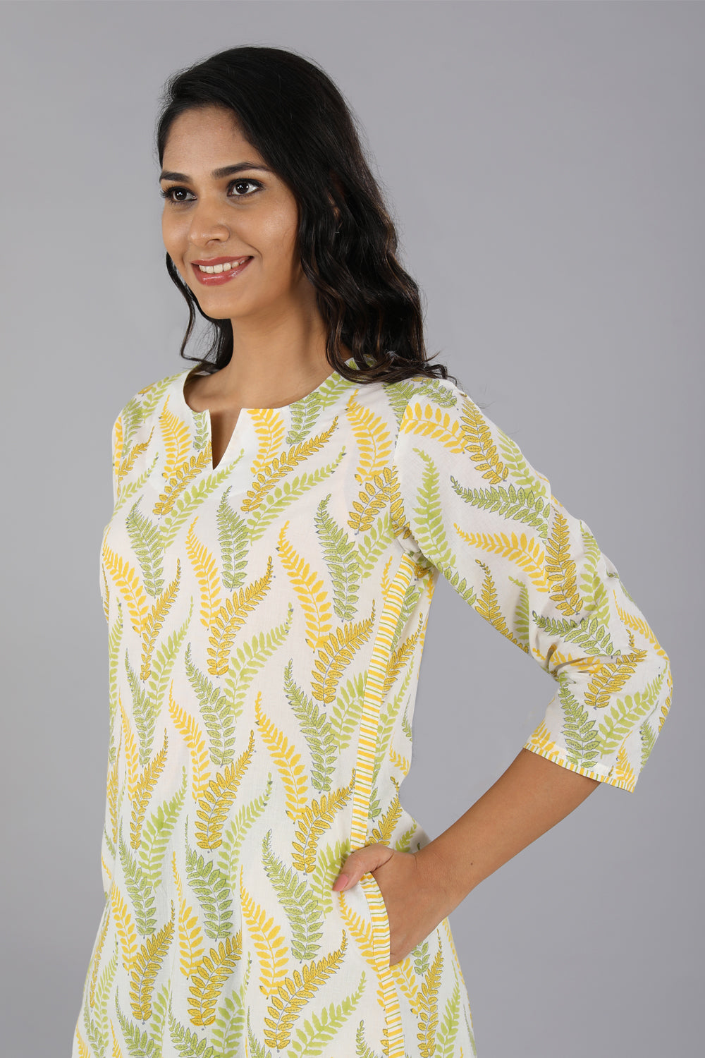 Collection of Lime yellow handblock printed cotton kurti in a gallery layout