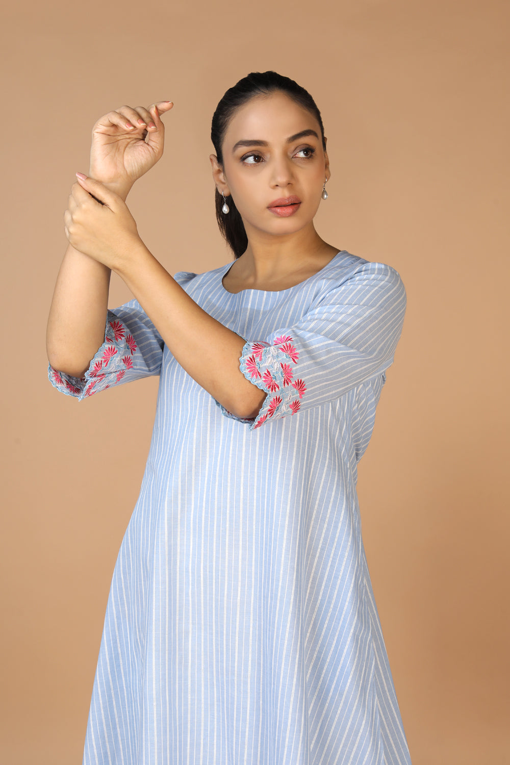 Collection of Pastel Blue Cotton Kurti in a gallery layout