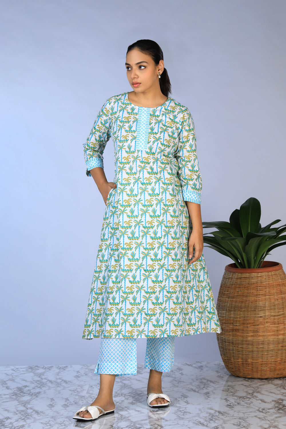 Collection of Handblock Printed A-line Kurti with pants set in a gallery layout