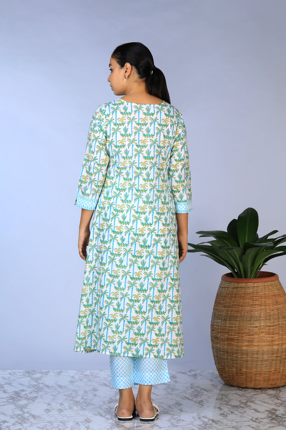 Collection of Handblock Printed A-line Kurti with pants set in a gallery layout