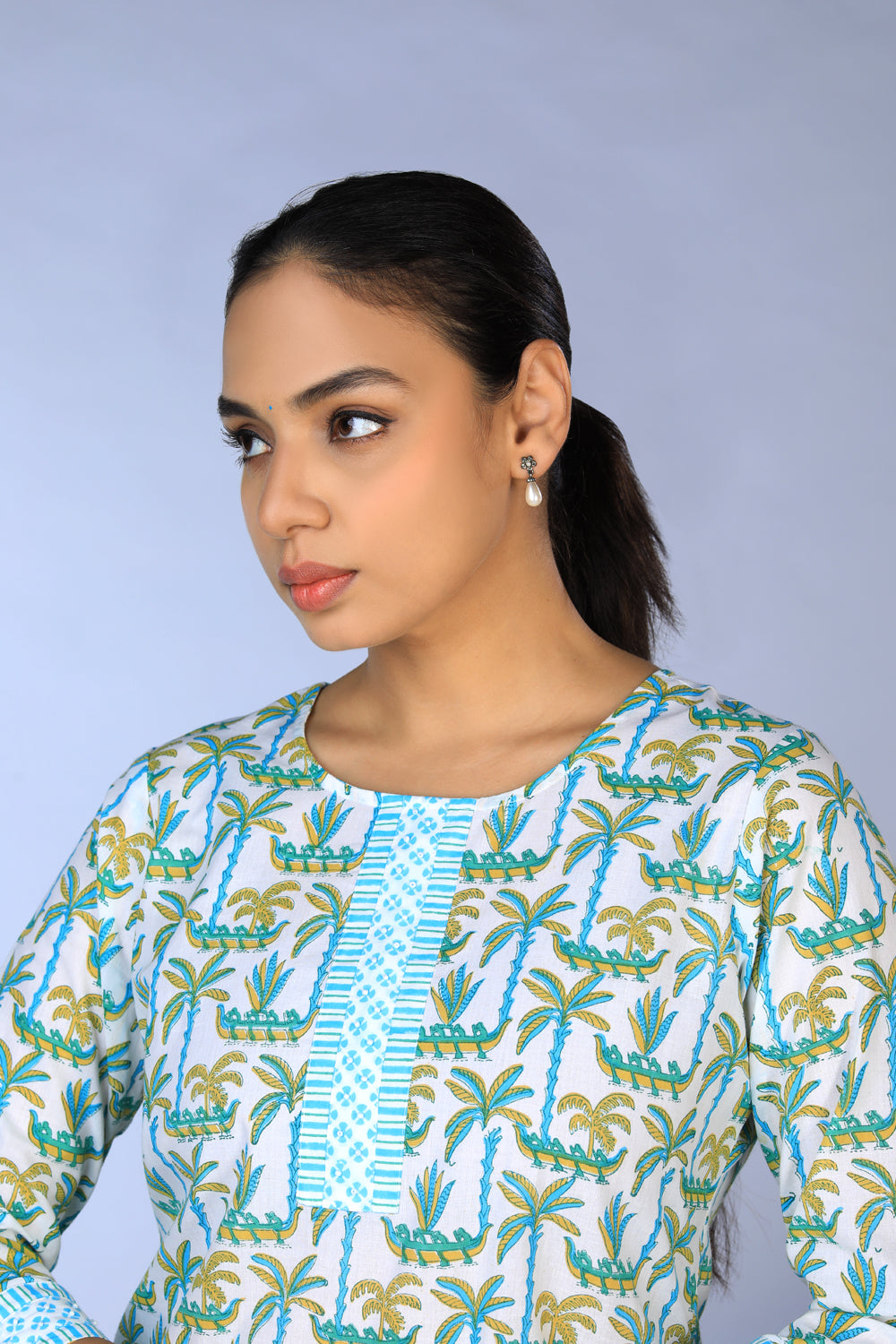 Collection of Handblock Printed A-line Kurti with pants set in a gallery layout