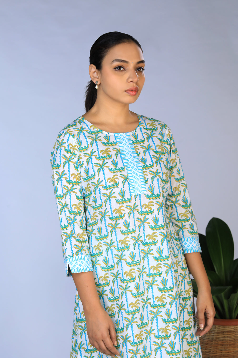 Collection of Handblock Printed A-line Kurti with pants set in a gallery layout