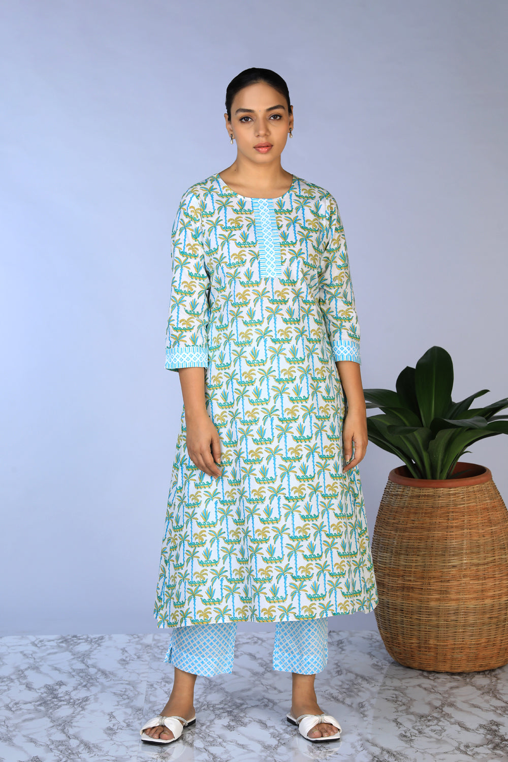 Collection of Handblock Printed A-line Kurti with pants set in a gallery layout