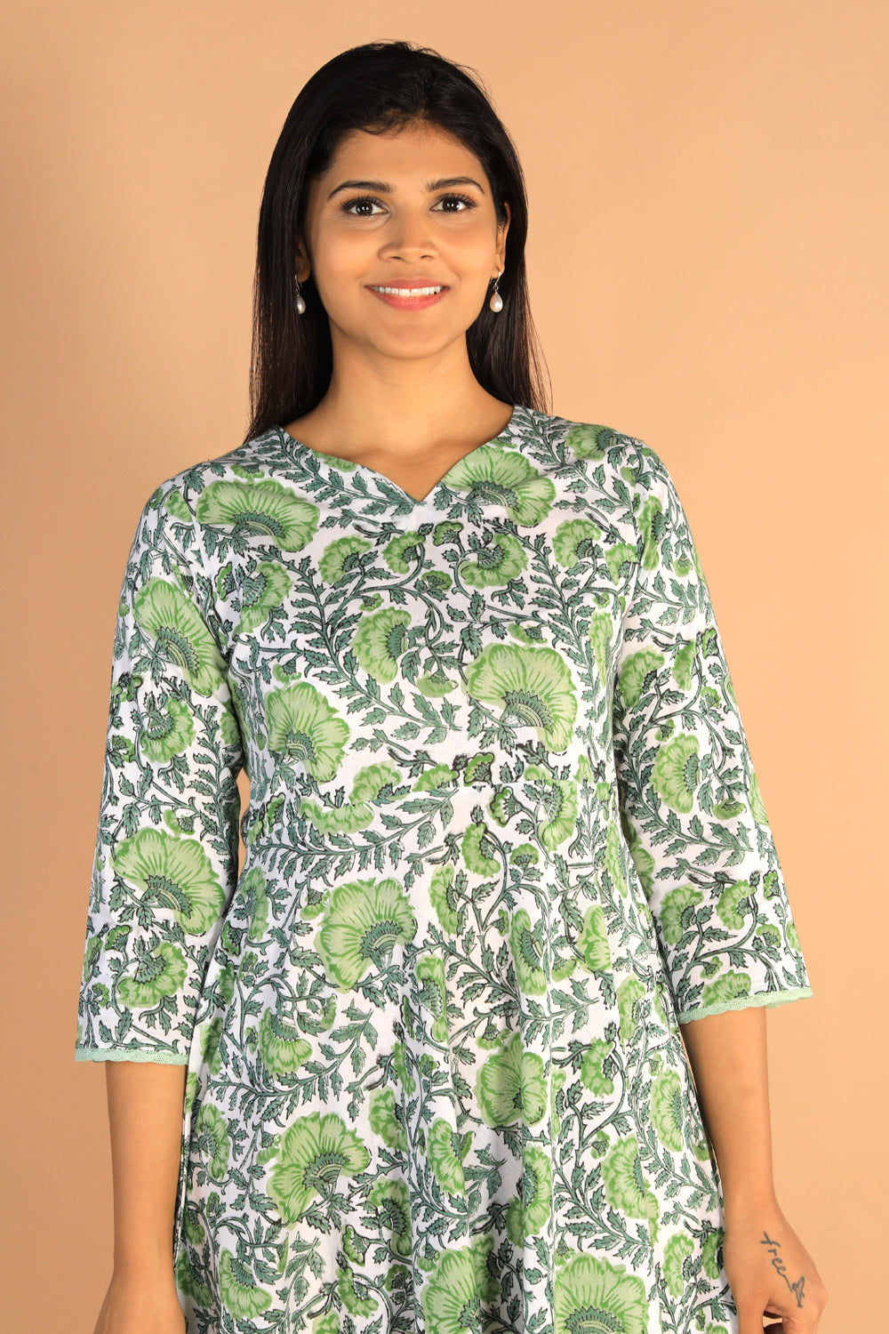 Collection of Floral Sanganeri hand block printed cotton dress in a gallery layout