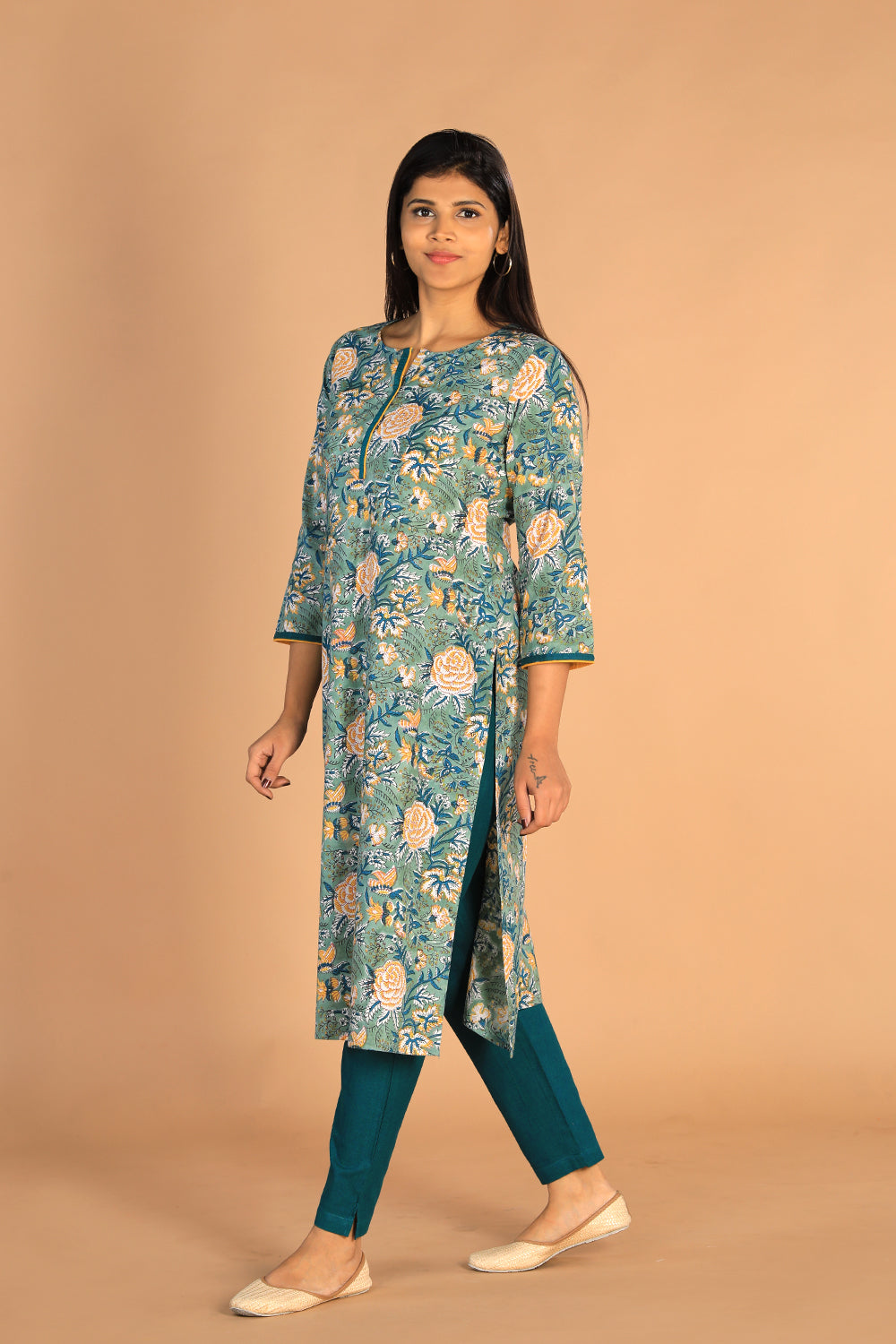 Collection of Floral Sanganeri hand block printed cotton dress in a gallery layout