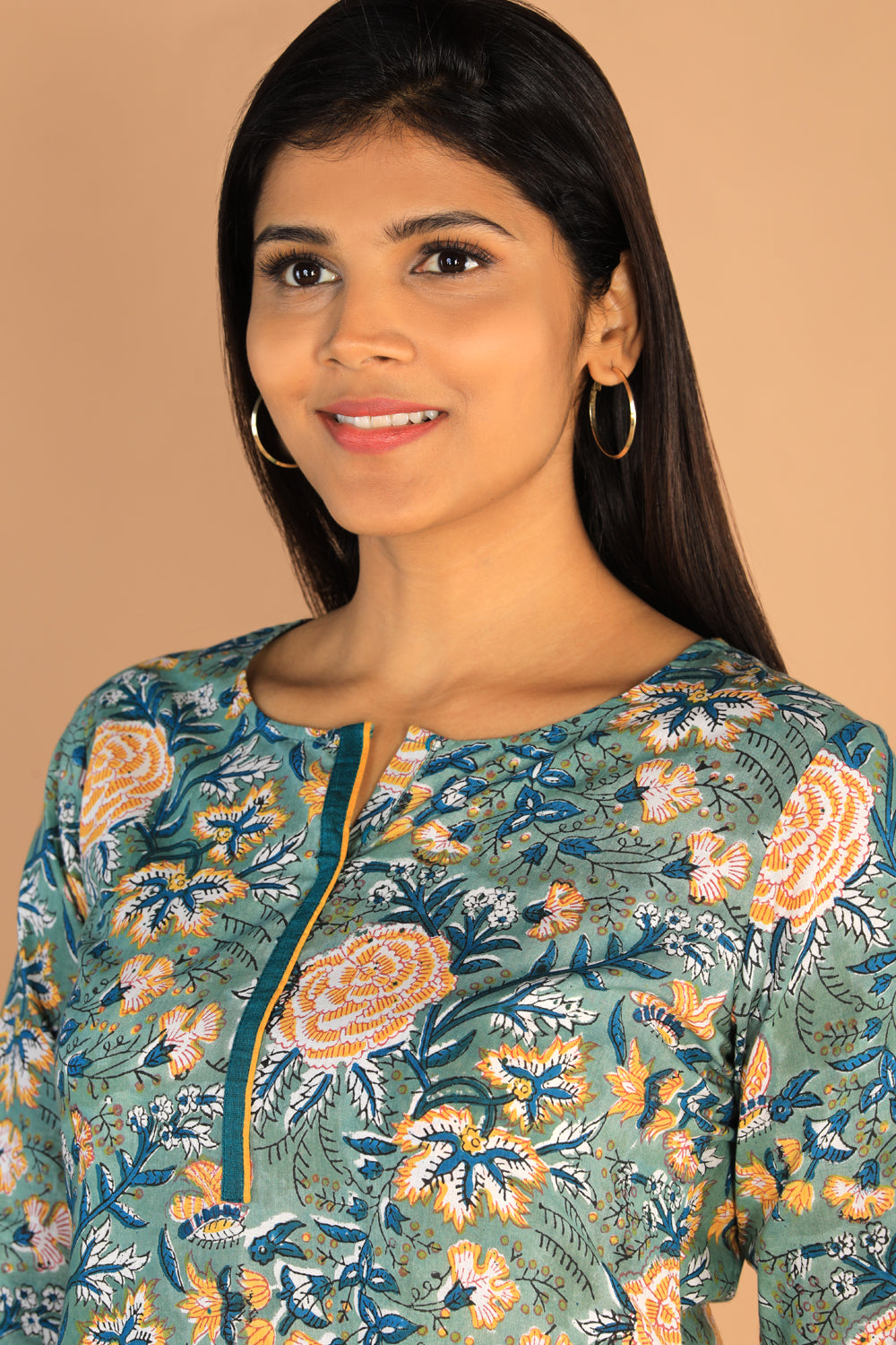 Collection of Floral Sanganeri hand block printed cotton dress in a gallery layout