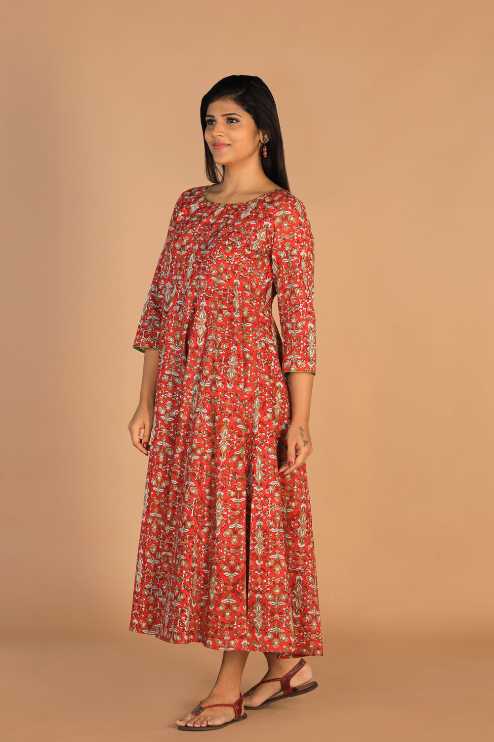 Collection of Block printed Deep red mirror embroidered Anarkali in a gallery layout