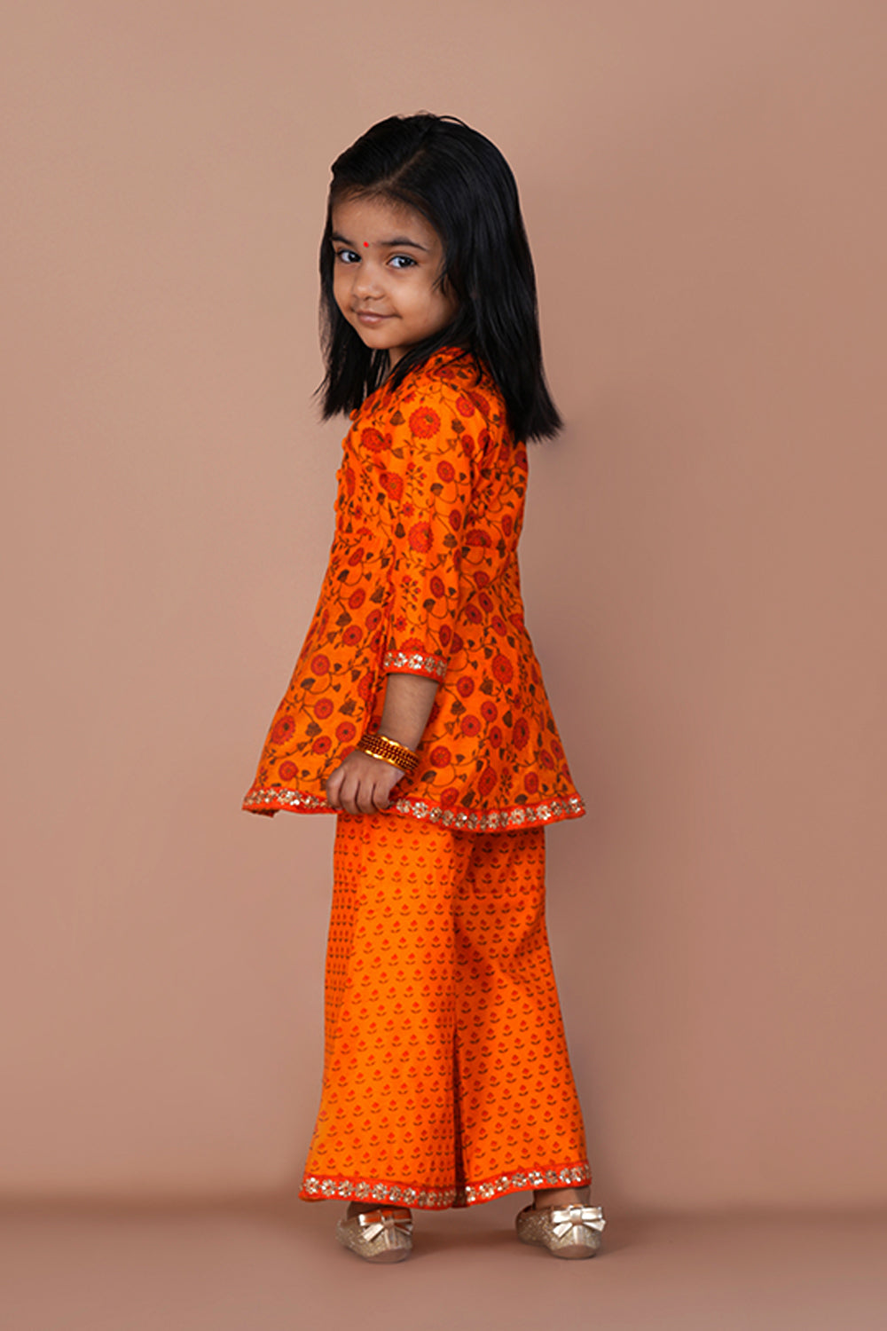 Image of Fruity orange floral printed Chanderi girls Gharara and Kurti set .