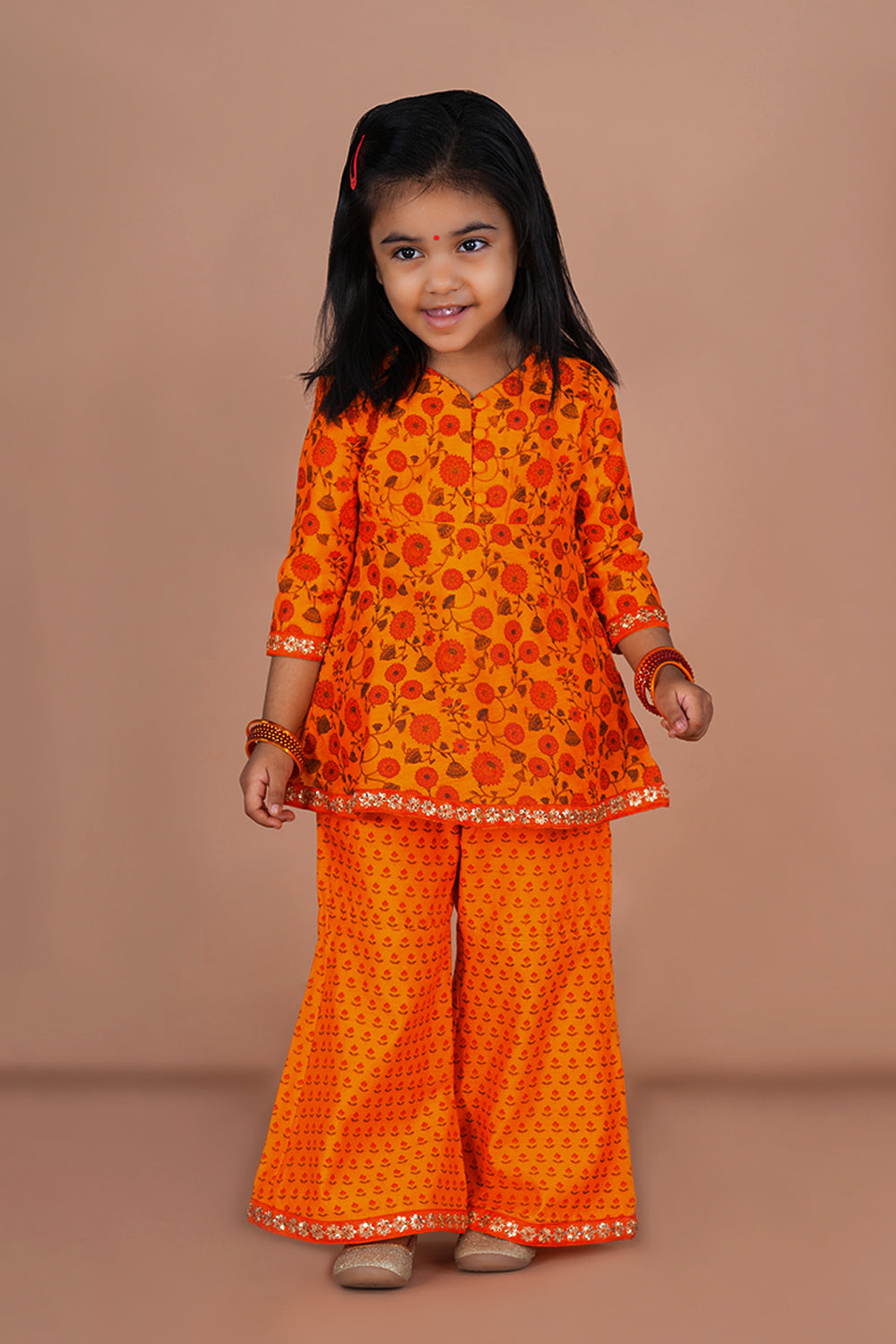 Fruity orange floral printed Chanderi girls Gharara and Kurti set .