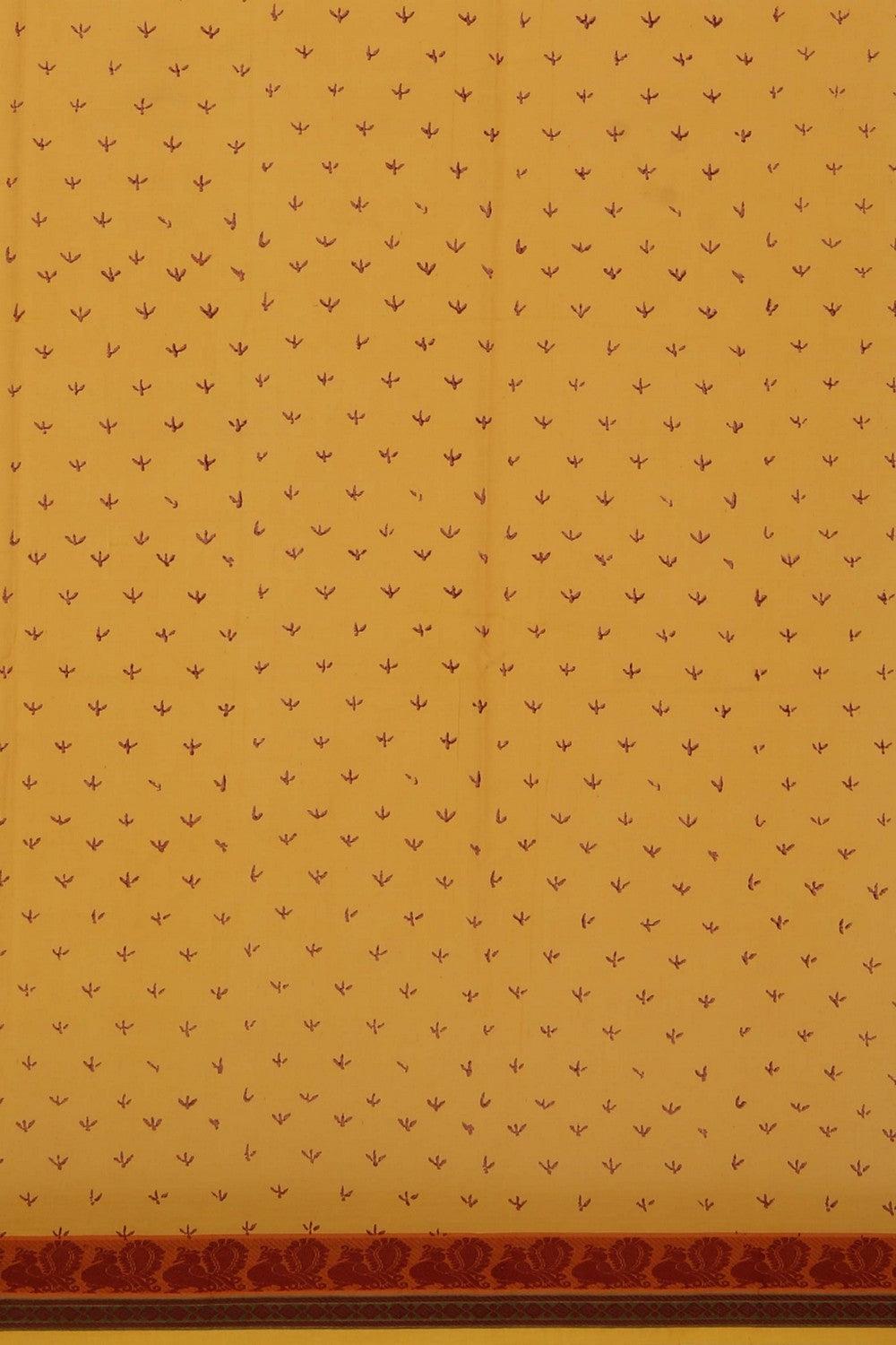 Sunrise yellow hand block printed cotton saree.