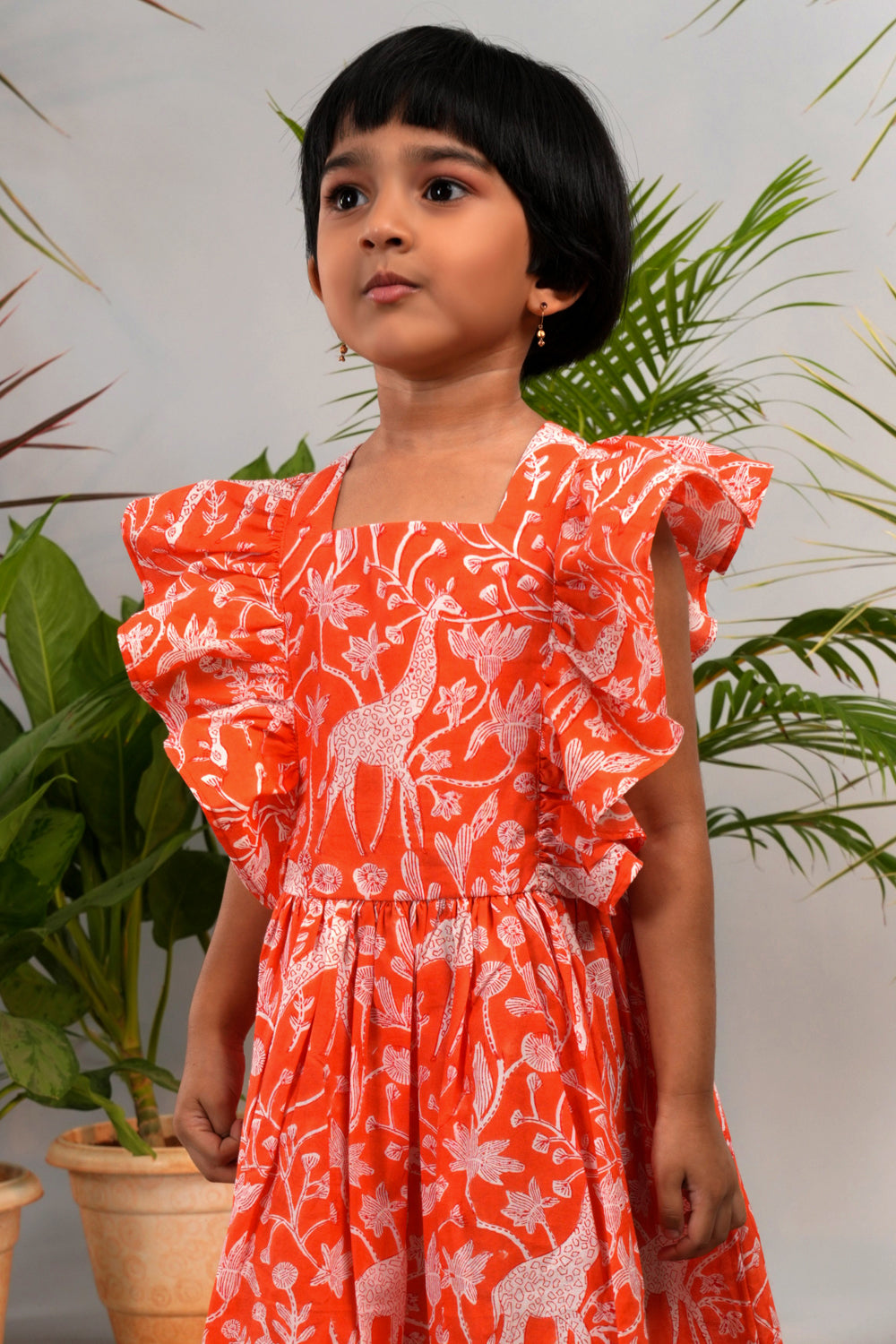 Image of Bright orange Giraffe block printed top