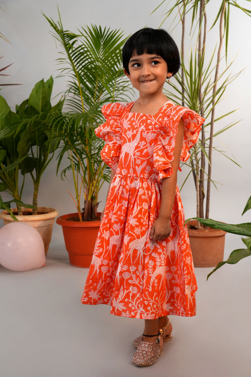 Image of Bright orange Giraffe block printed top