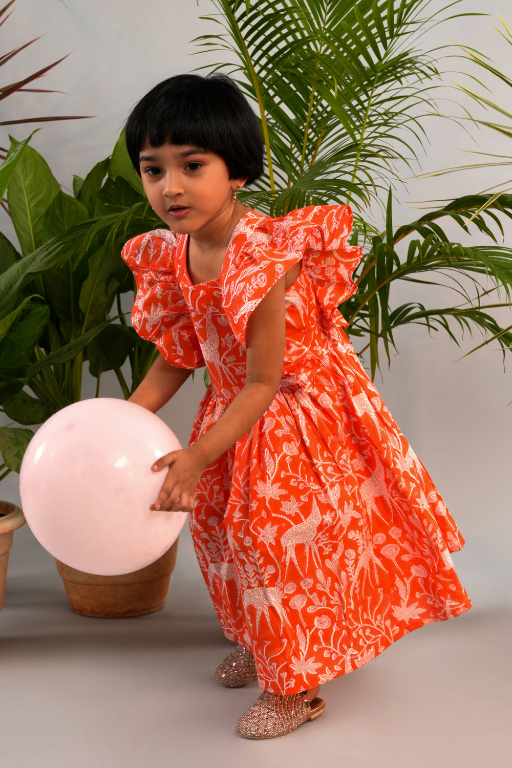 Image of Bright orange Giraffe block printed top