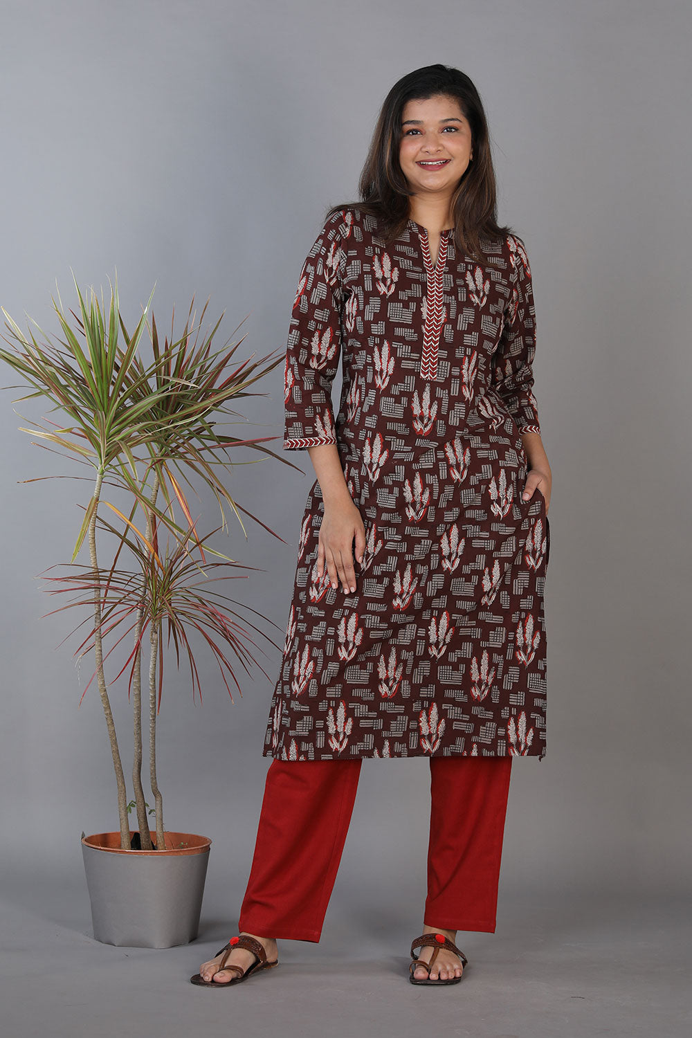 Collection of Black Hand Block Printed Cotton Straight Fit Kurti in a gallery layout