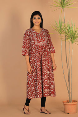 Collection of Embroidered Cotton Bagh Kurti in a gallery layout