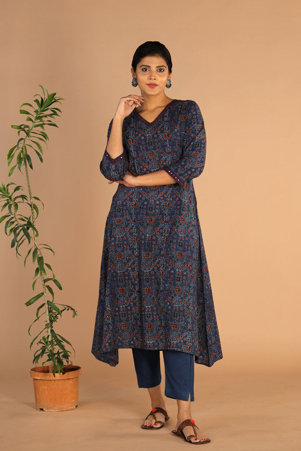 Collection of Ajrakh Embroidered A Line Kurti in a gallery layout