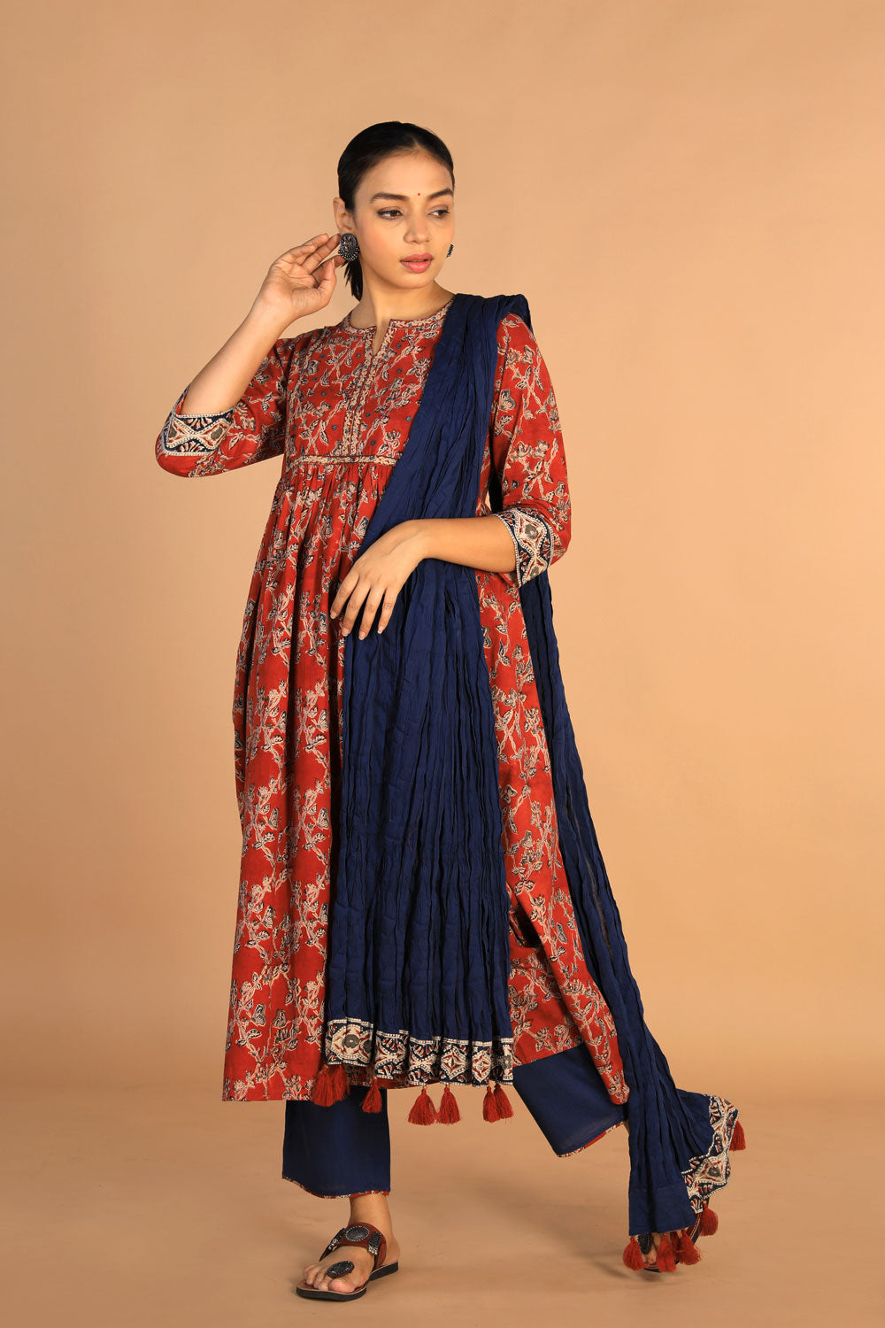 Collection of Maroon Kalamkari Kurti With Pant And Dupatta in a gallery layout