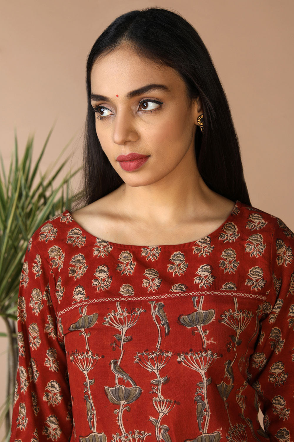 Collection of Block printed cotton Kalamkari kurti in a gallery layout