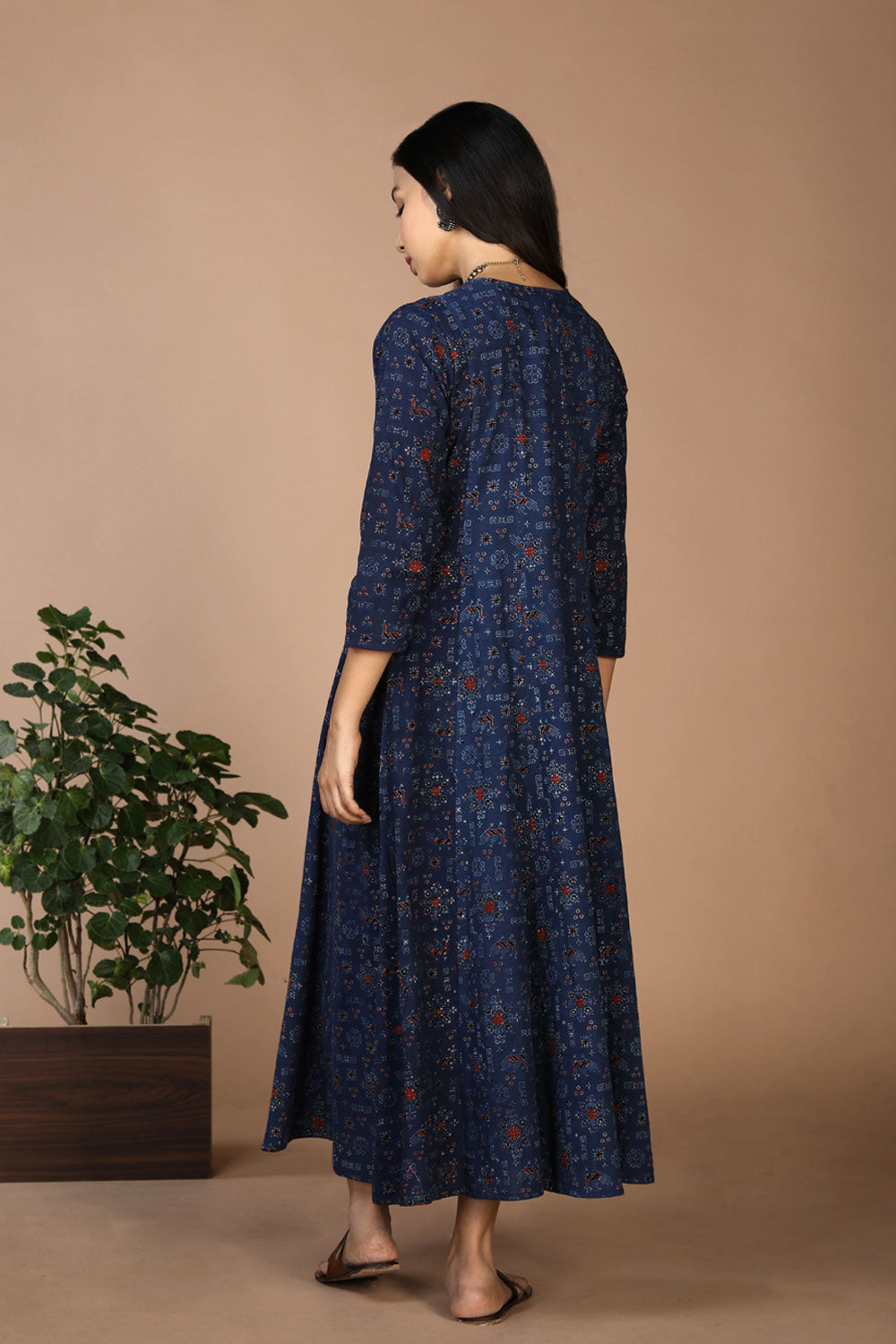 Collection of Indigo Ajrak handblockprinted panelled kurta in a gallery layout