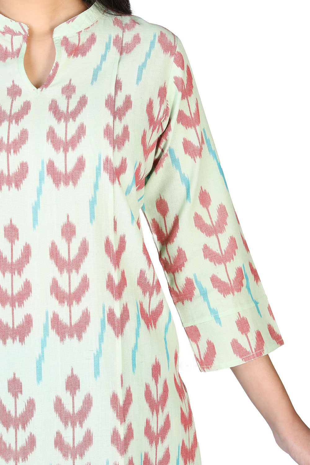 Collection of Pista green cotton ikat kurti in a gallery layout