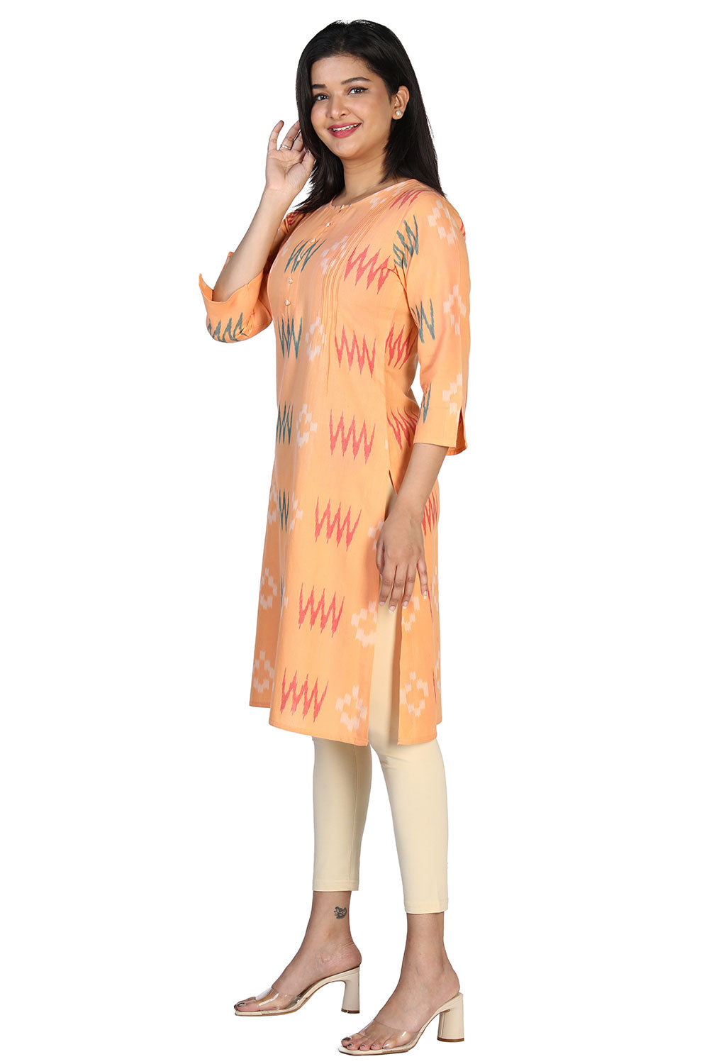 Collection of Orange peel cotton ikkat kurti in a gallery layout