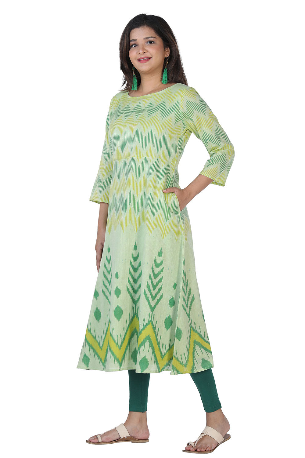 Collection of Sap green mercerized handwoven cotton Ikat long kurti in a gallery layout