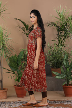 Collection of Maroon floral Kalamkari handblockprinted kurti in a gallery layout