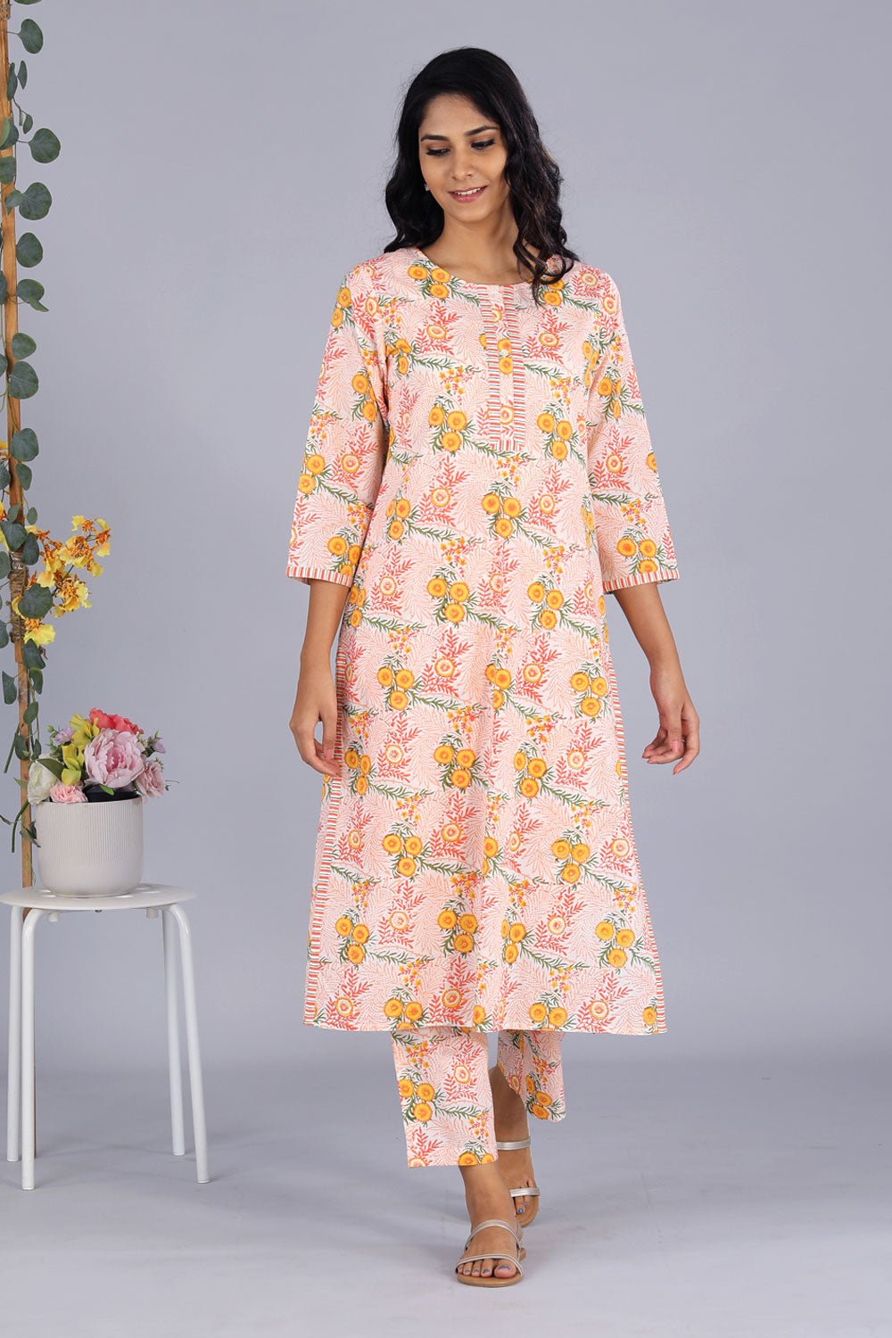 Collection of Handblock Printed Orange Kurti And Pants Set in a gallery layout