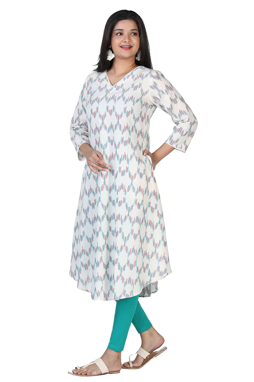 Collection of Offwhite flared cotton ikkat kurti in a gallery layout