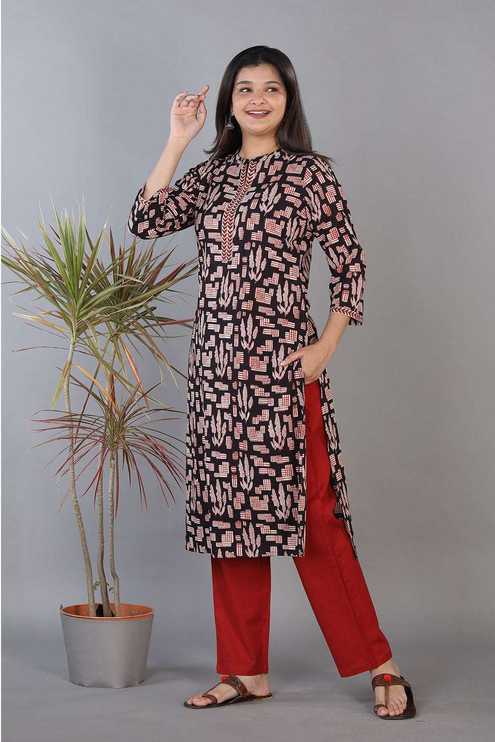 Black hand block printed cotton straight fit kurti.