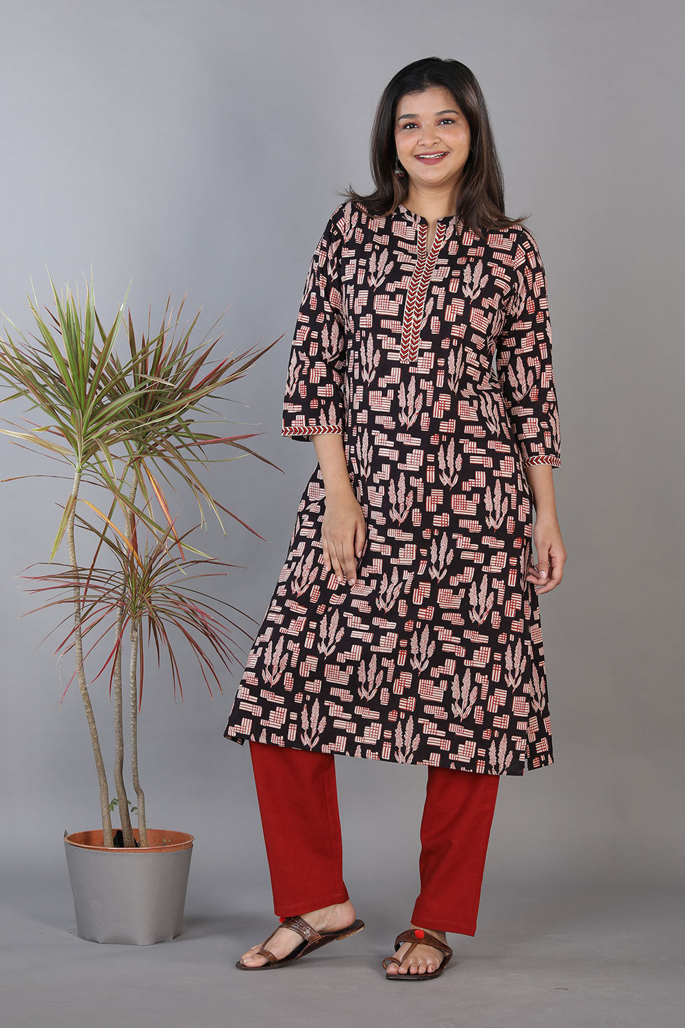 Black hand block printed cotton straight fit kurti.