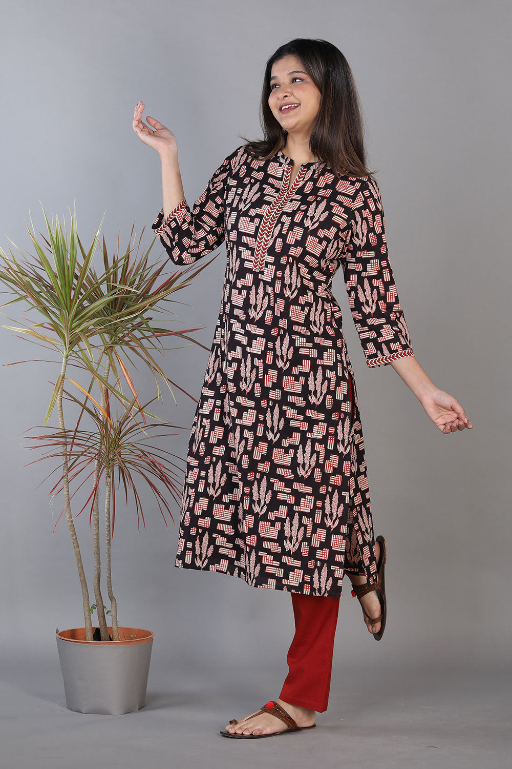 Black hand block printed cotton straight fit kurti.