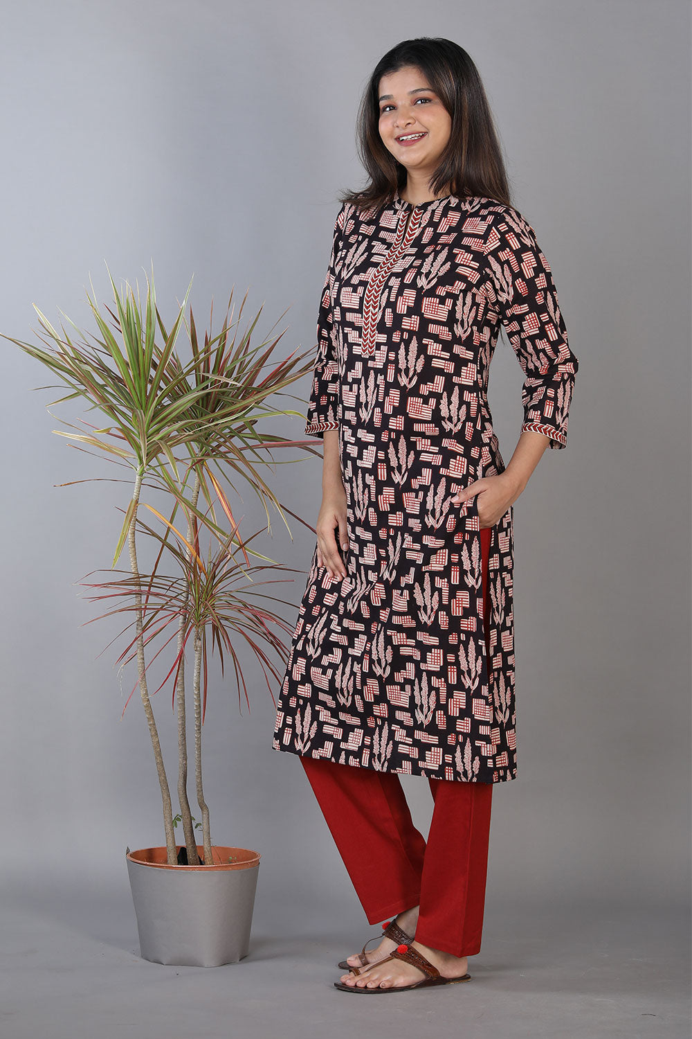 Black hand block printed cotton straight fit kurti.