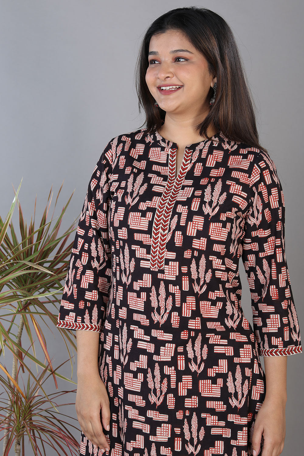 Black hand block printed cotton straight fit kurti.