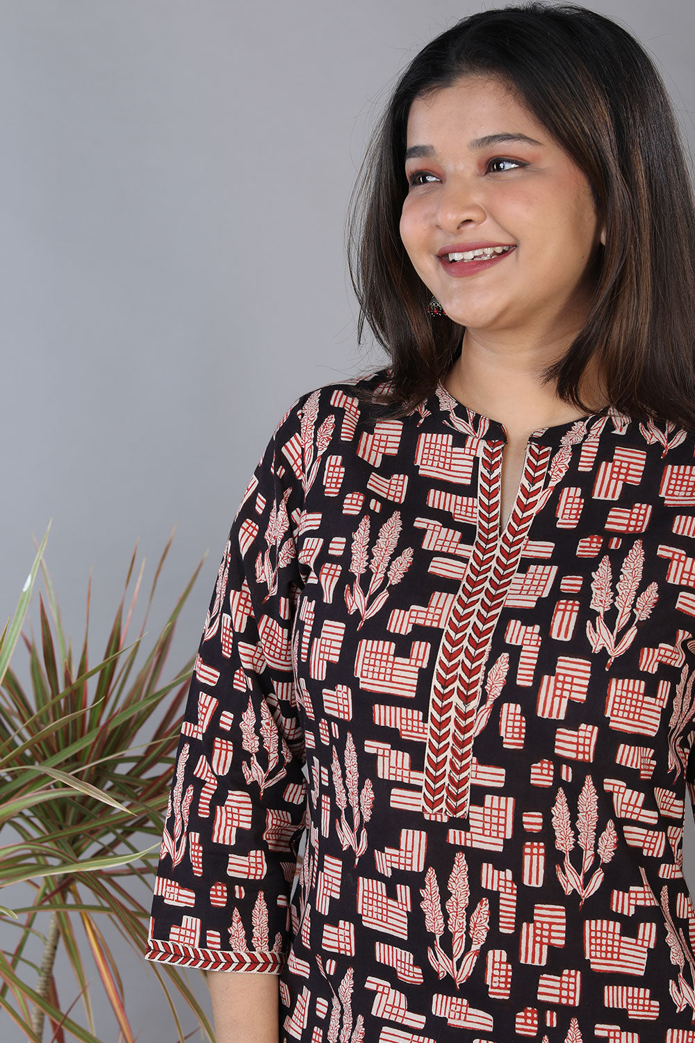 Black hand block printed cotton straight fit kurti.