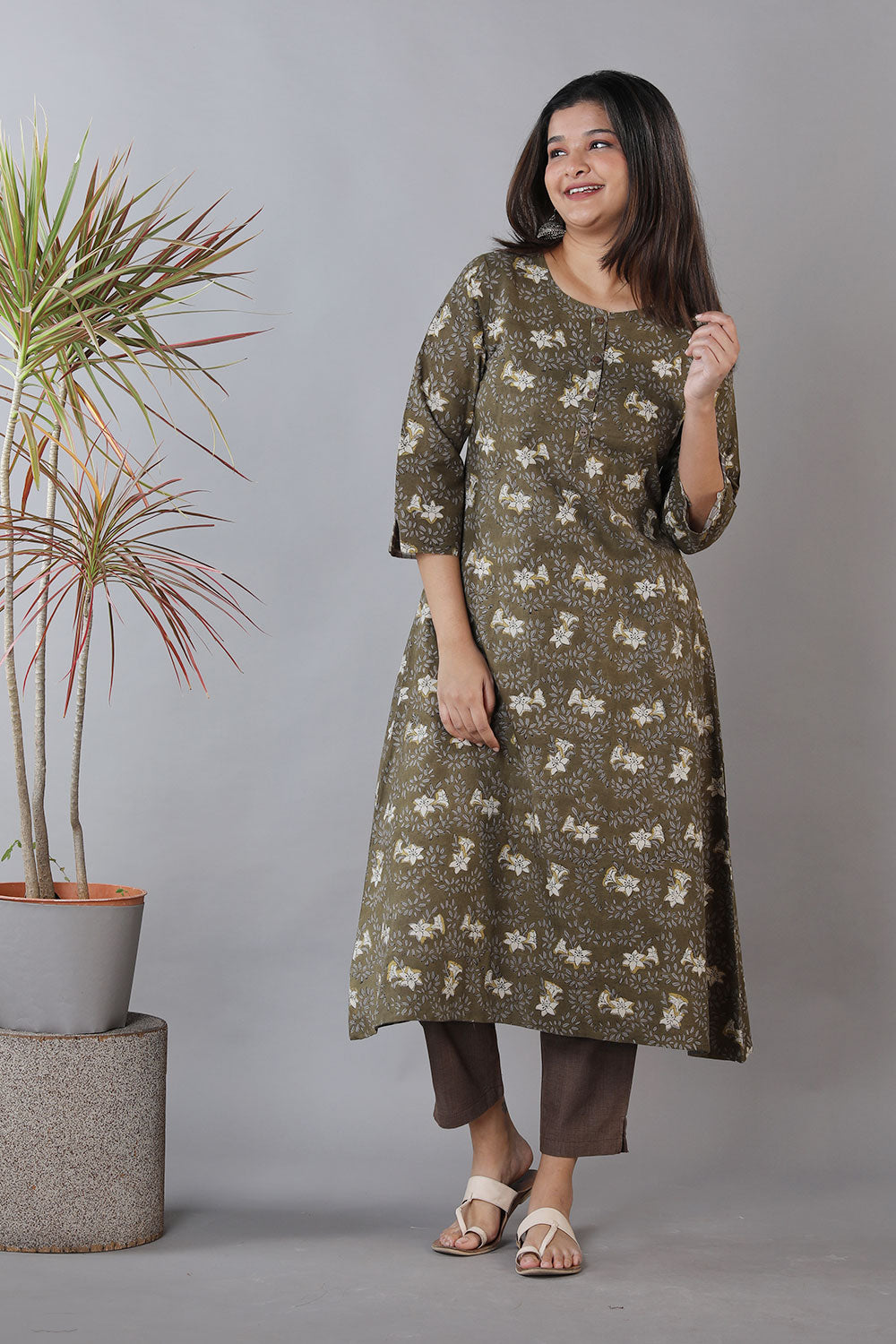 Collection of Fern green and coal grey hand block printed Bagru A-line cotton kurti. in a gallery layout