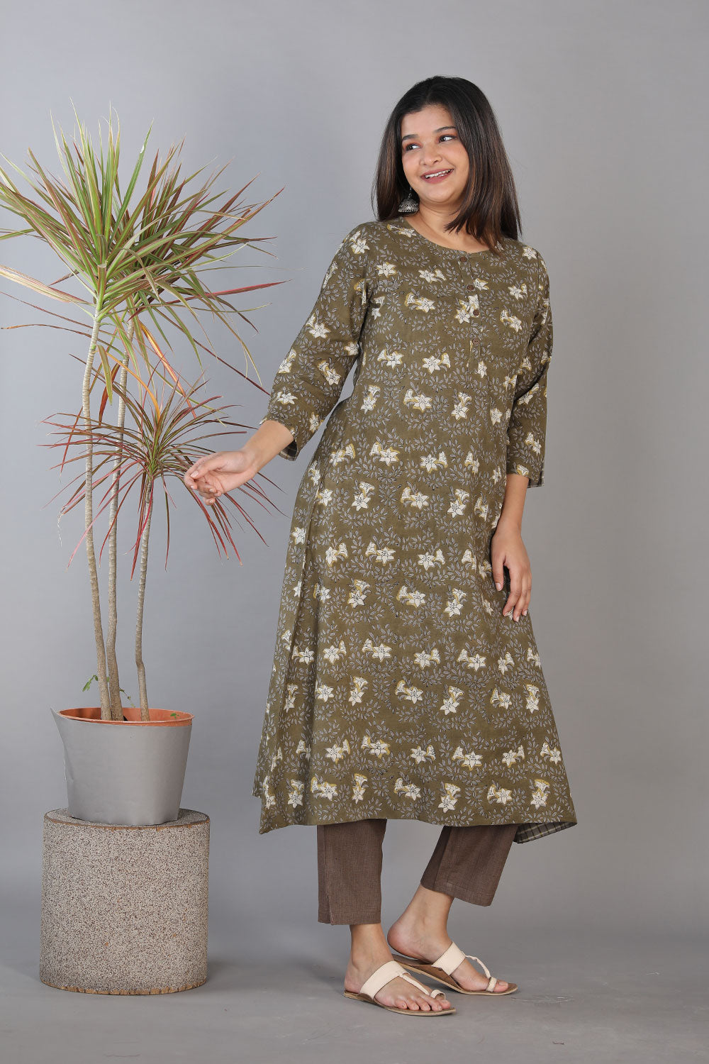 Collection of Fern green and coal grey hand block printed Bagru A-line cotton kurti. in a gallery layout